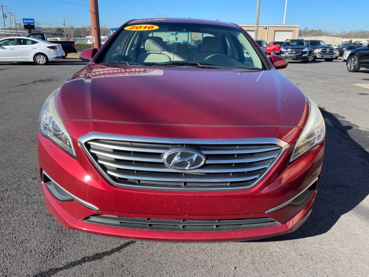 2016 Maroon Hyundai Sonata (5NPE24AF6GH) with an 4-Cyl, 2.4 Liter engine, Auto, 6-Spd w/Shiftronic and Drive Mode Select transmission, located at 8008 Warden Rd, Sherwood, AR, 72120, (501) 801-6100, 34.830078, -92.186684 - Photo#2